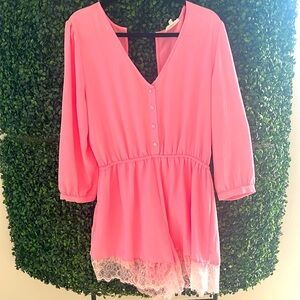 Pink short romper. Large. Lace trim. Open back. Button closure.